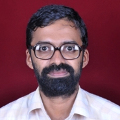 Dr. Dinesh T.